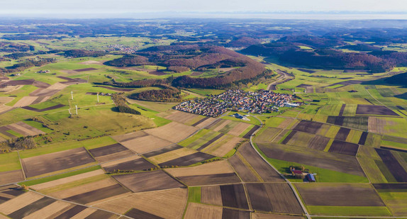Germany, Baden-Wuerttemberg, Melchingen, aerial view of fields and wind farm